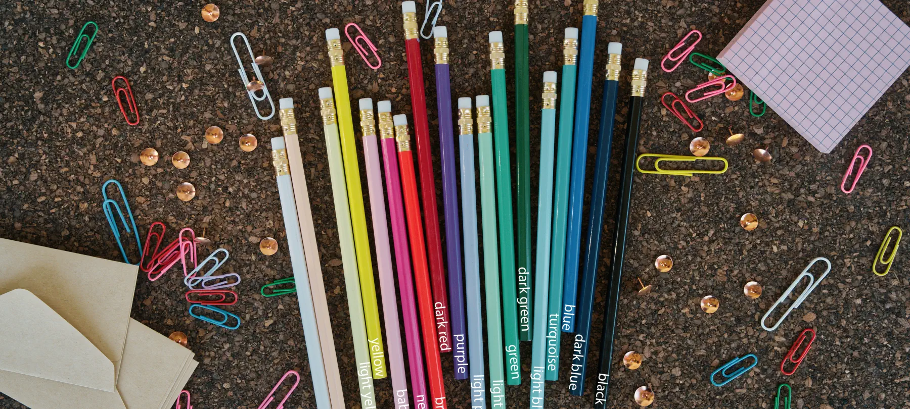 All 18 Scribbly pencil colours laid out on a desk